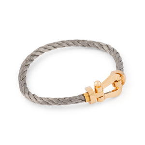 Bracelet de la maison Fred force 10 en or et acier